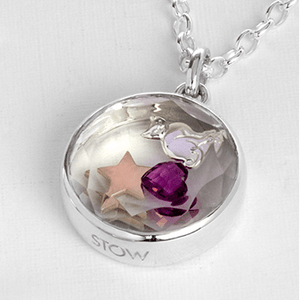 Locket with charms