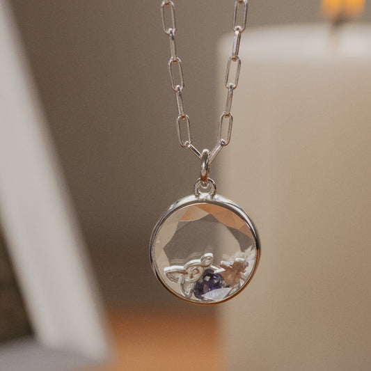 Knot of Motherhood charm in round faceted Stow locket